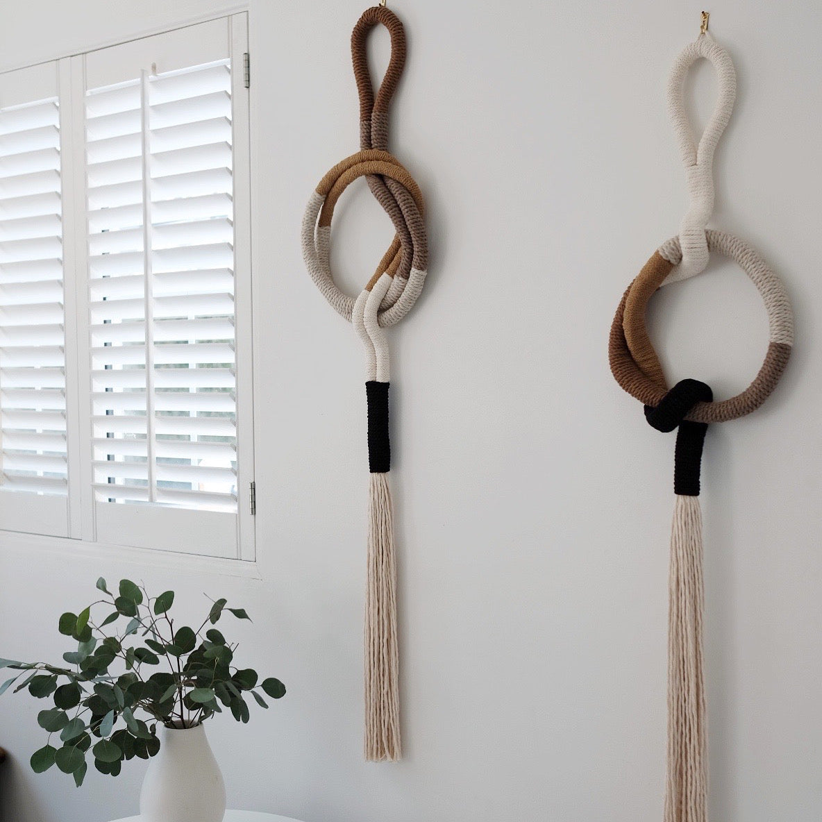 wrapped wall hanging in neutral colors