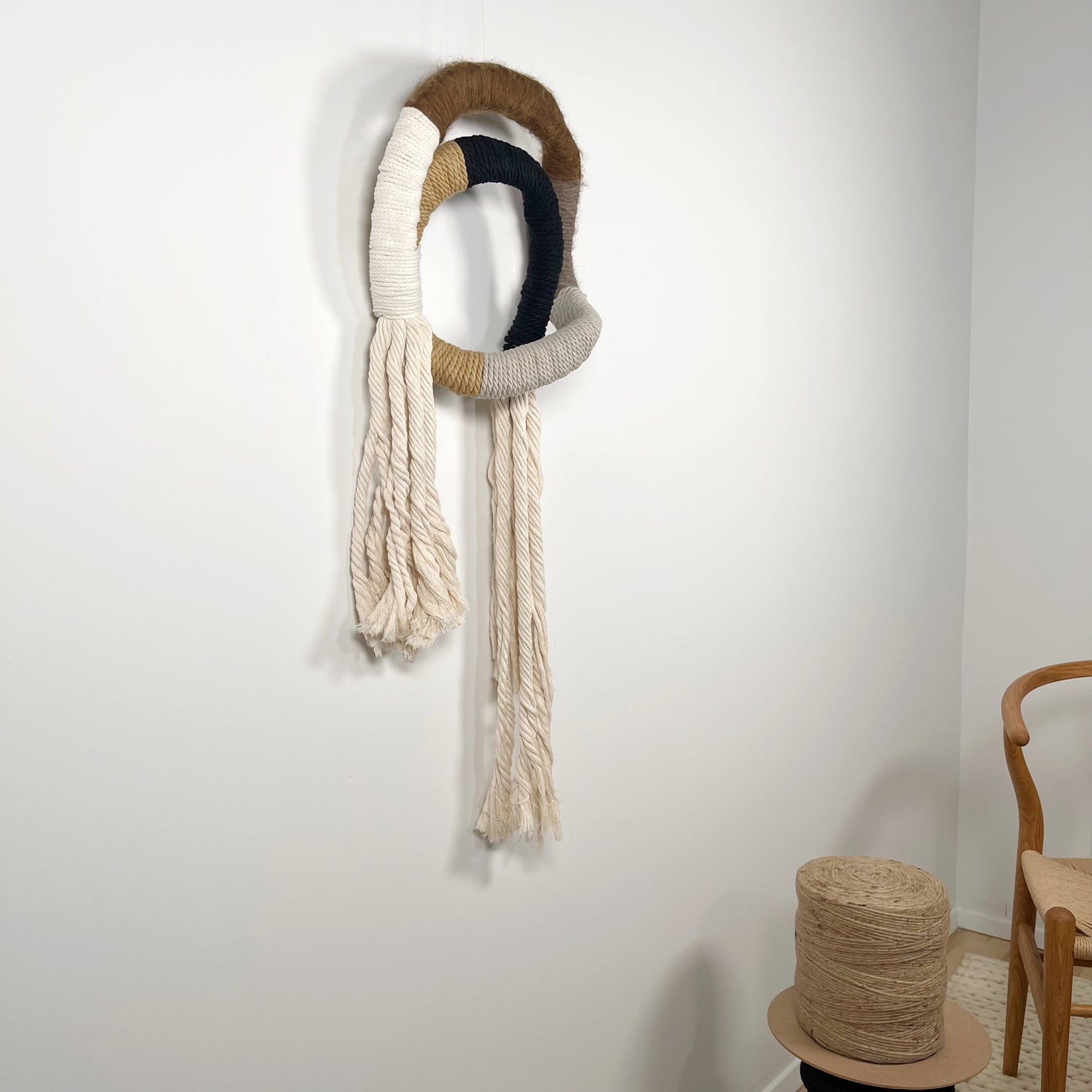 wrapped wall hanging in neutral colors